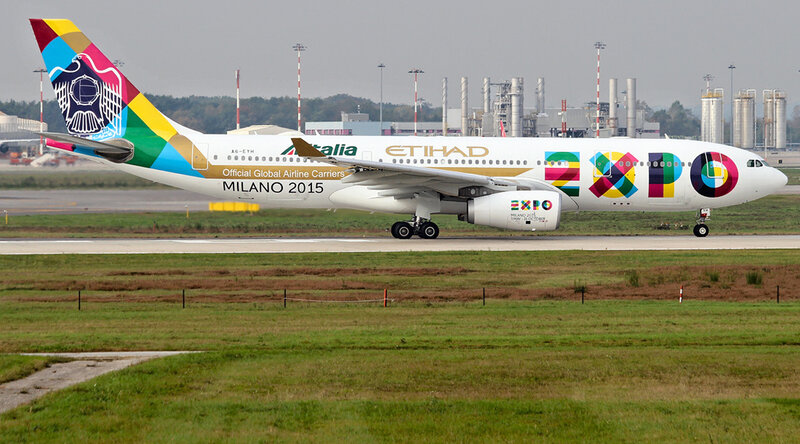 Airplane on Runway — White, Neutral, Afternoon