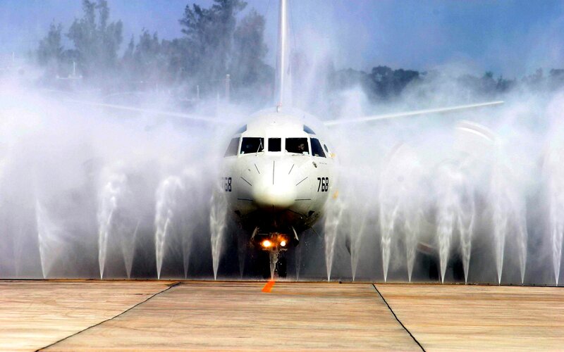 Airplane on Runway — White