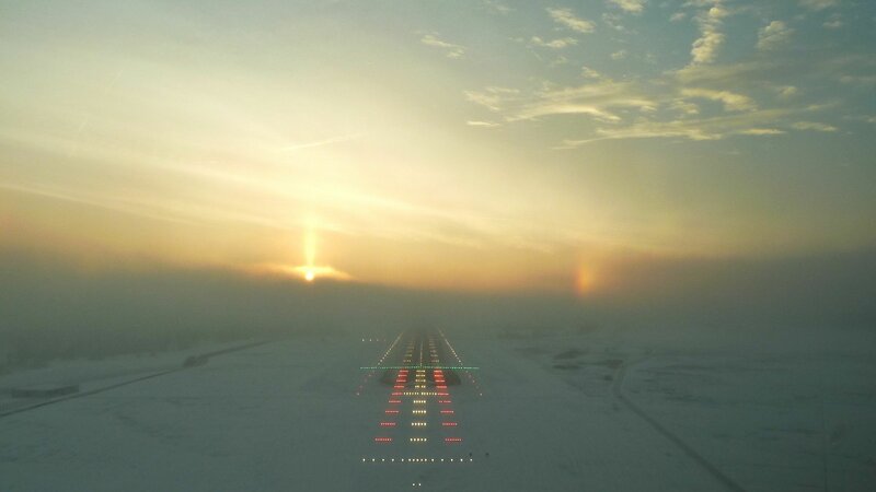 Airplane on Snowy Runway