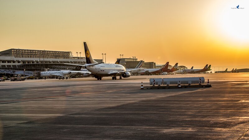 Airplane on Tarmac — Orange, Serene