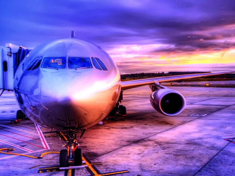 Airplane on Tarmac — Purple