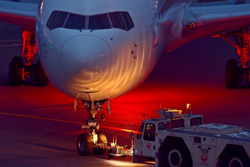 Airplane on Tarmac — Red, Dramatic, Night