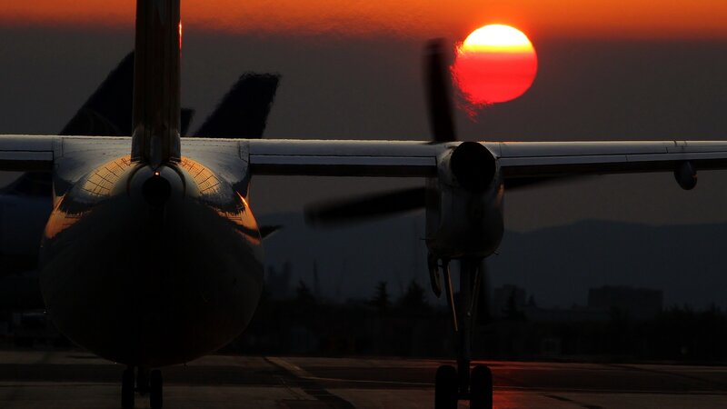Airplane on Tarmac — Red, Dramatic, Sunset