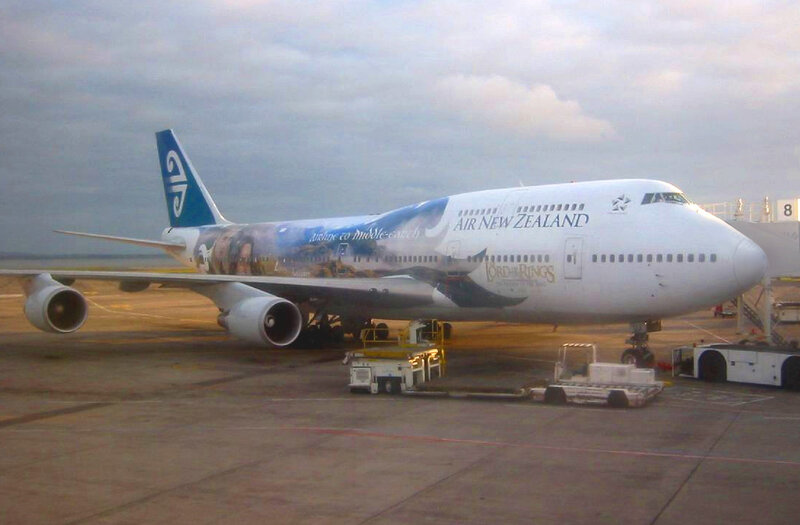 Airplane on Tarmac — White, Overcast