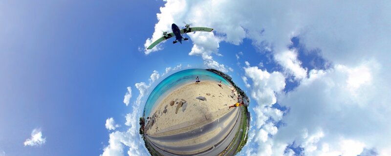 Airplane over Beach — Blue