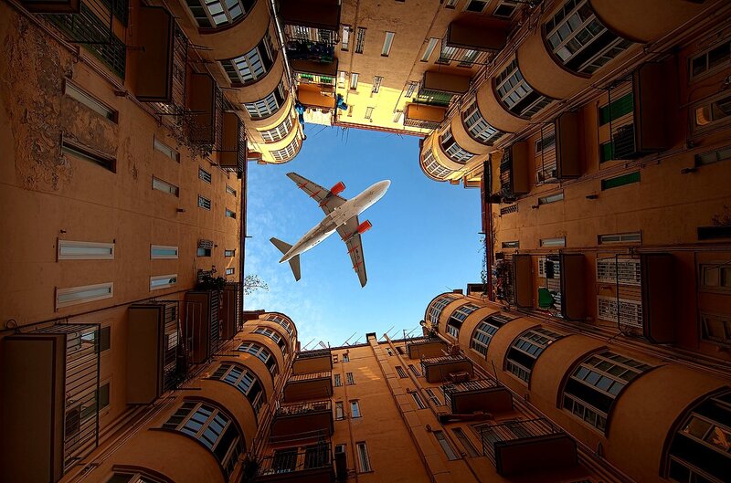 Airplane over Buildings