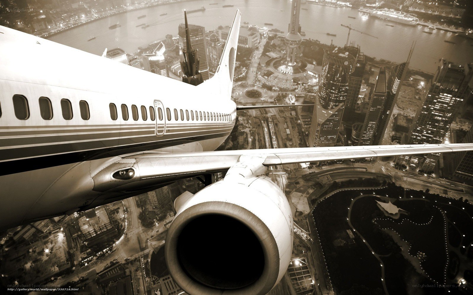 Airplane over city skyline