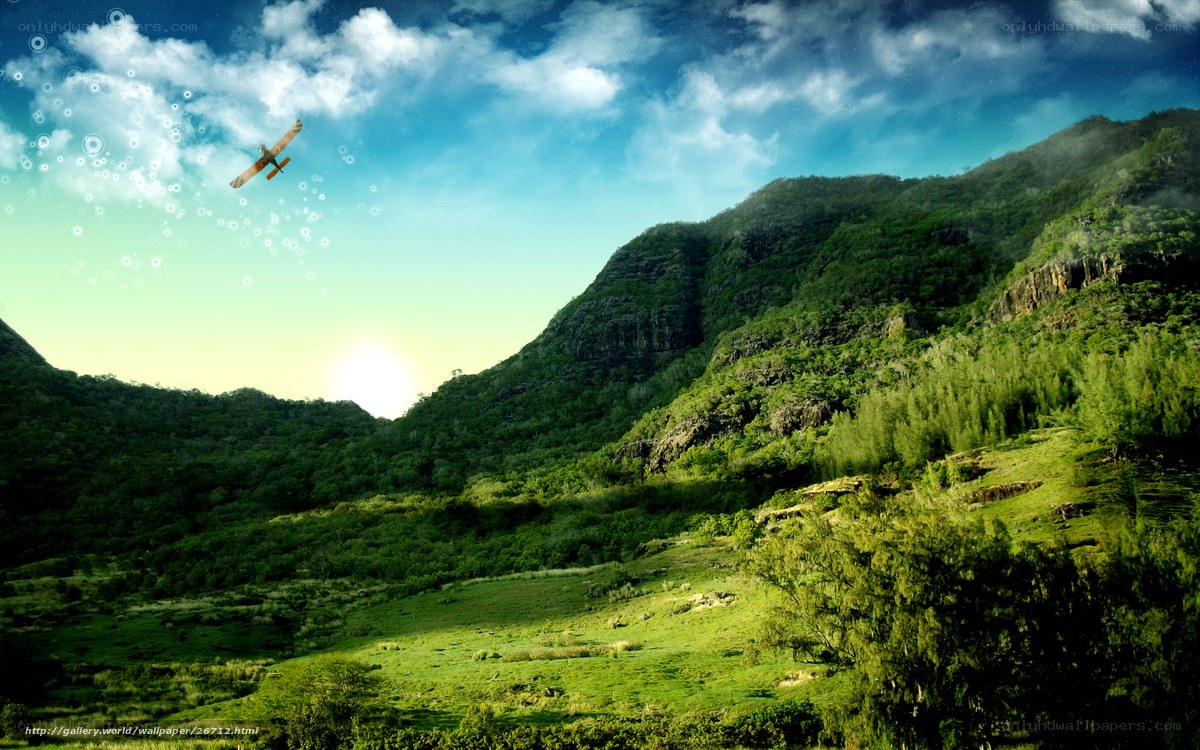 Airplane over green mountains