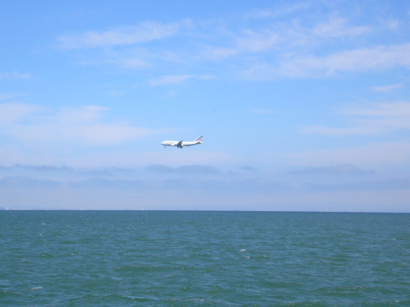 Airplane over Ocean — Blue, Serene