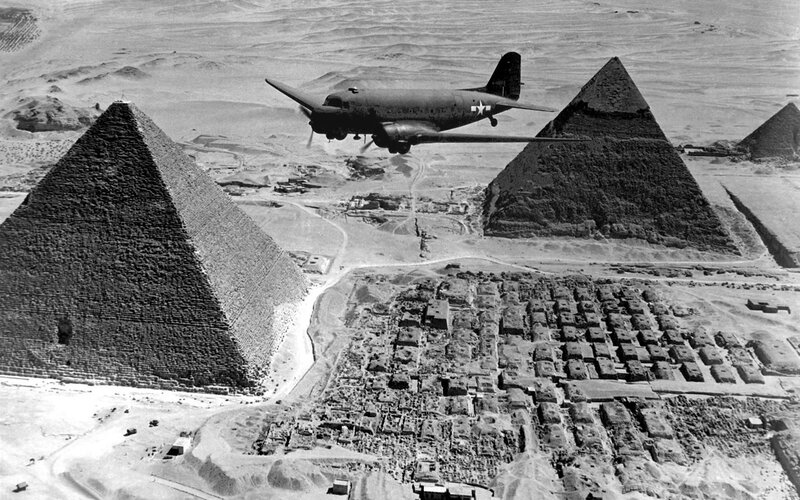 Airplane over Pyramids