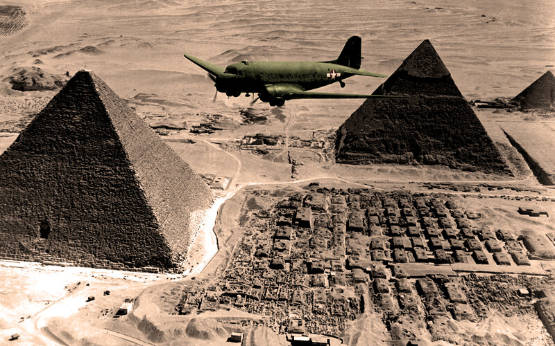 Airplane over the pyramids