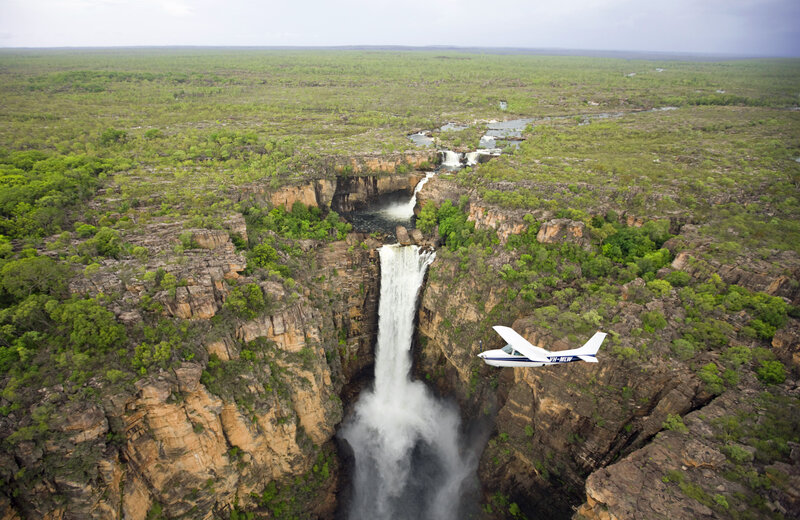 Airplane over Waterfall — Green
