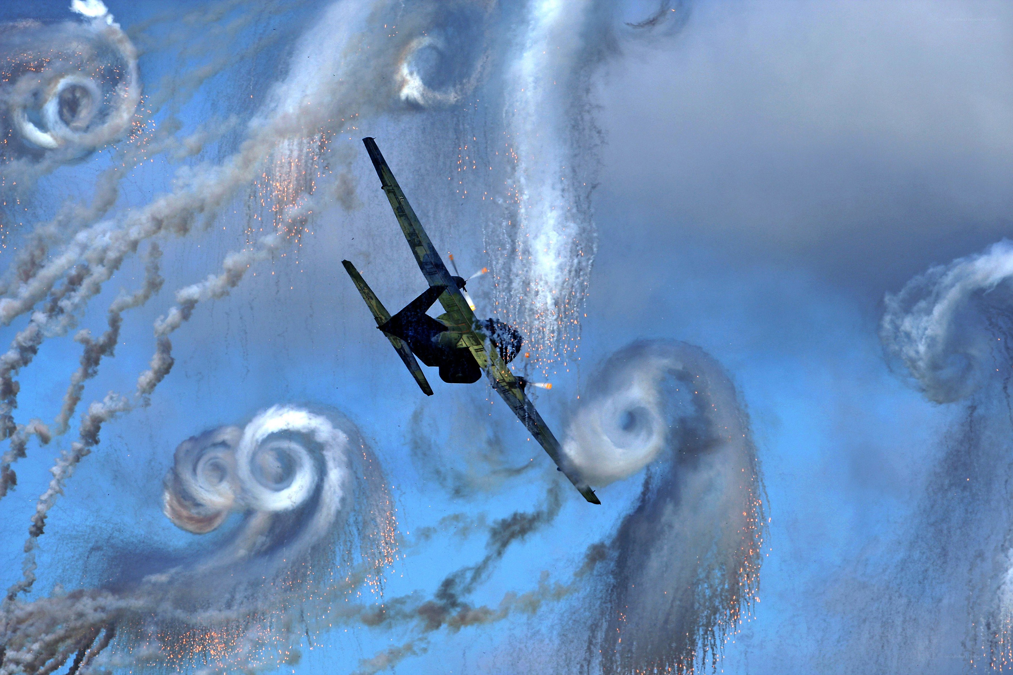 Airplane performing aerobatic display