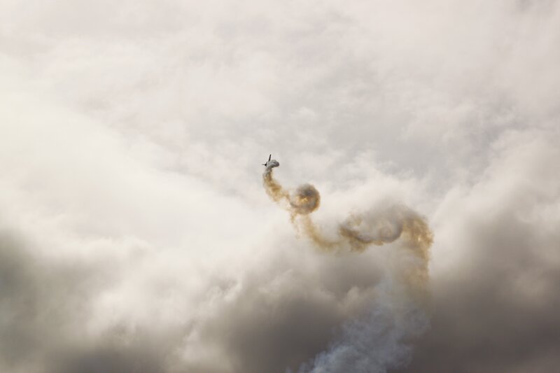 Airplane Performing Aerobatic — Gray, Dramatic