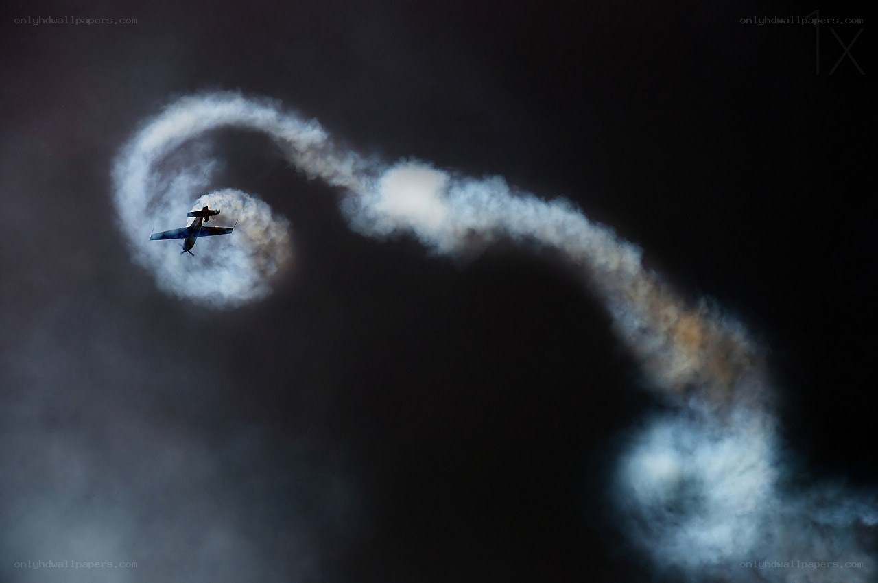 Airplane performing aerobatic loop