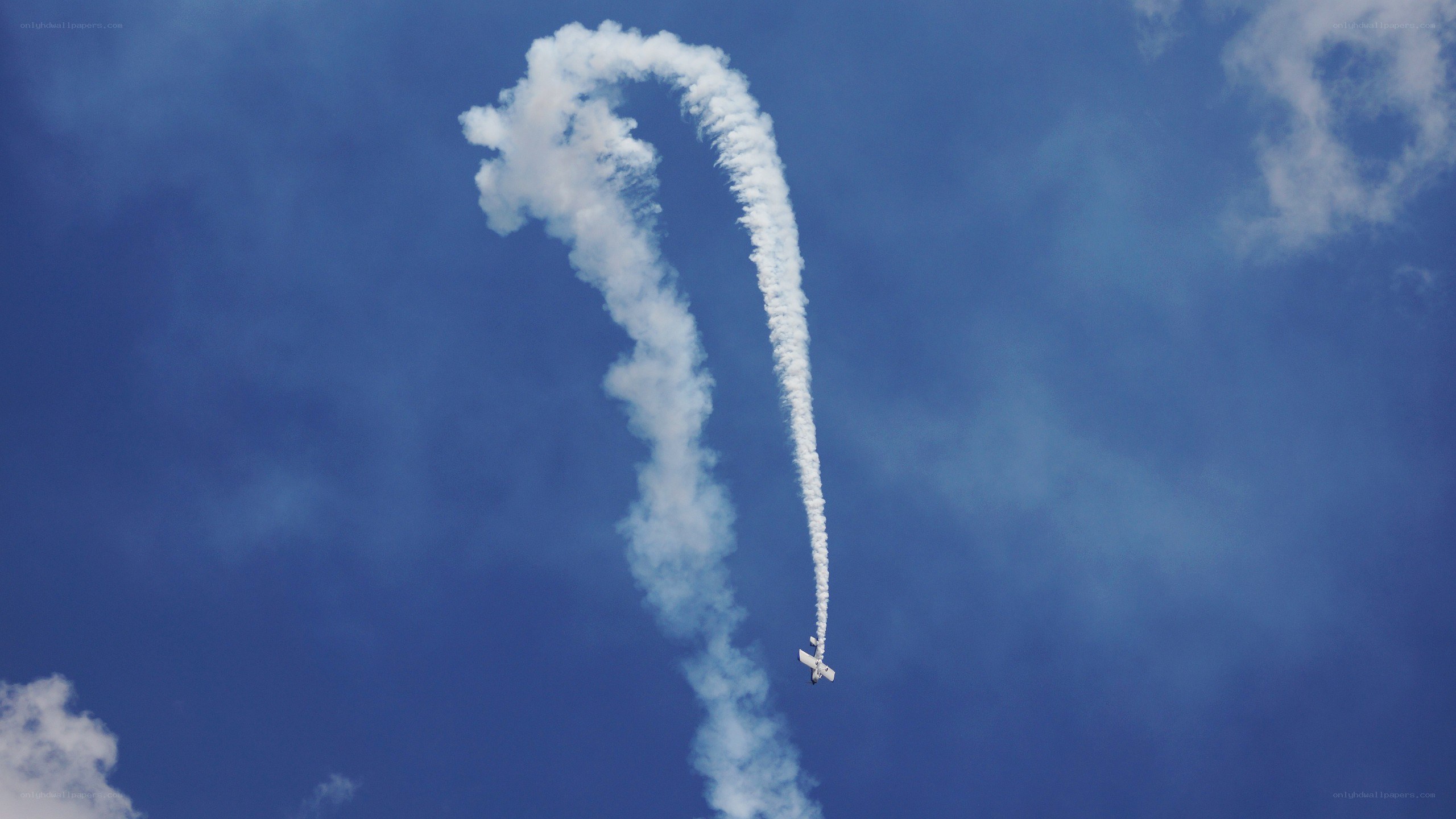 airplane performing aerobatic loop