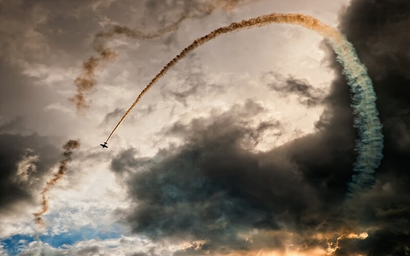 Airplane Performing Aerobatic Loop — Gray