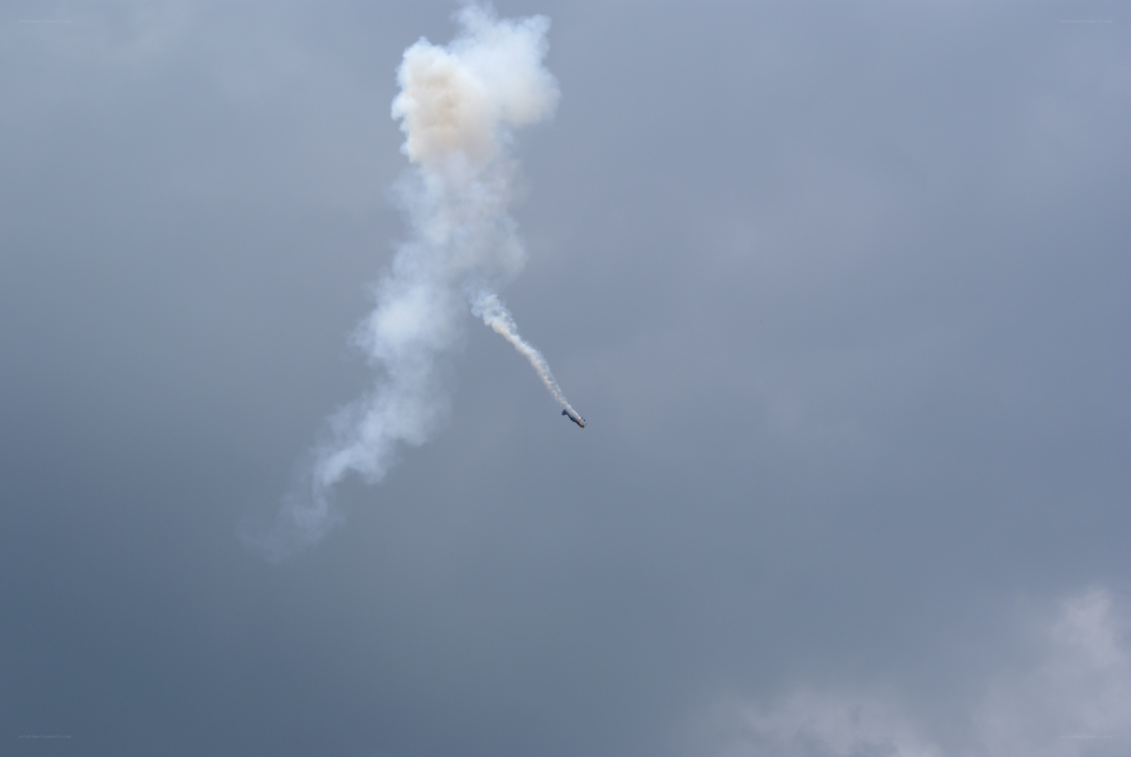 Airplane performing aerobatic maneuver