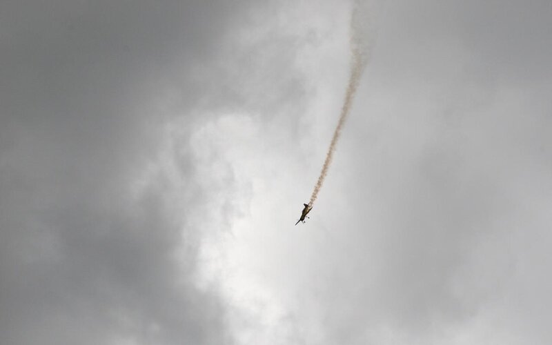 airplane performing aerobatic maneuver