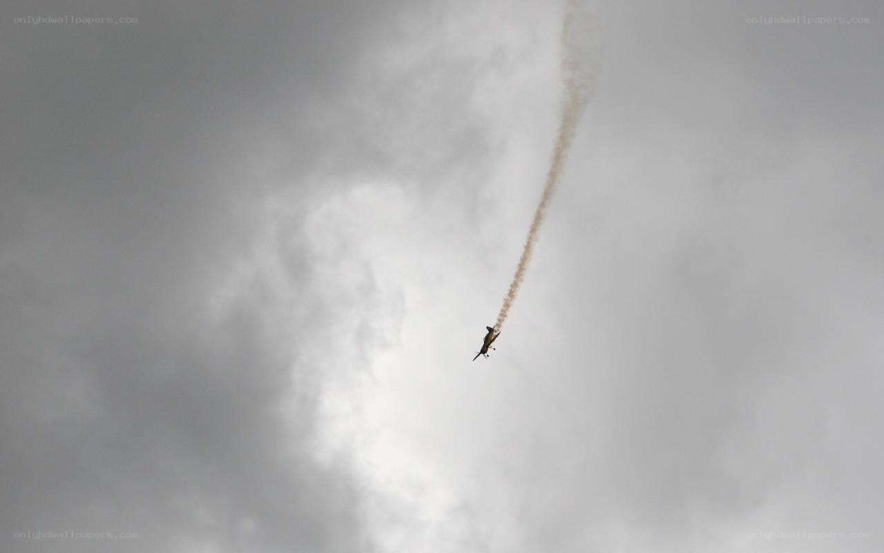 airplane performing aerobatic maneuver