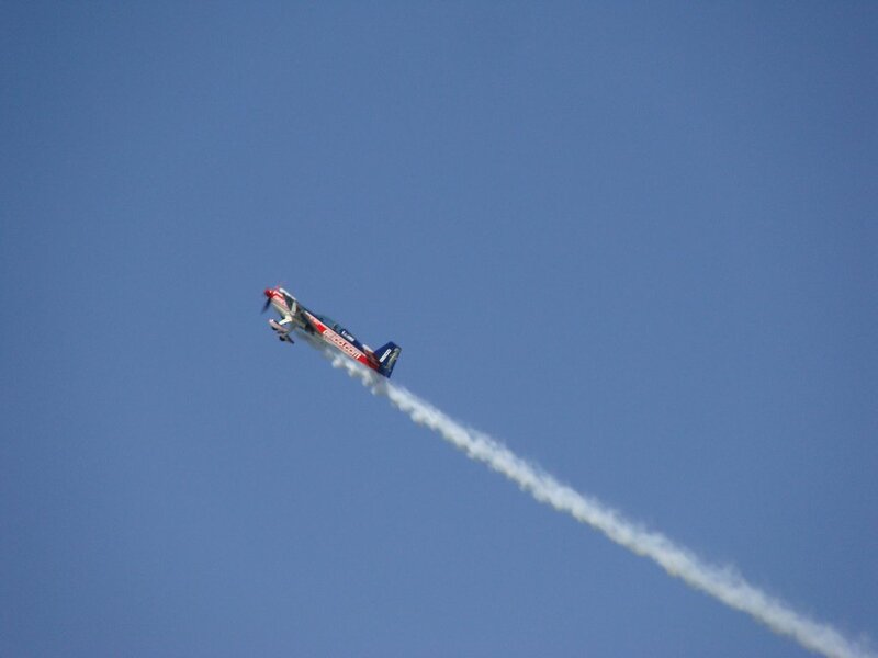 airplane performing aerobatic stunt