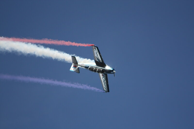 airplane performing aerobatic stunt