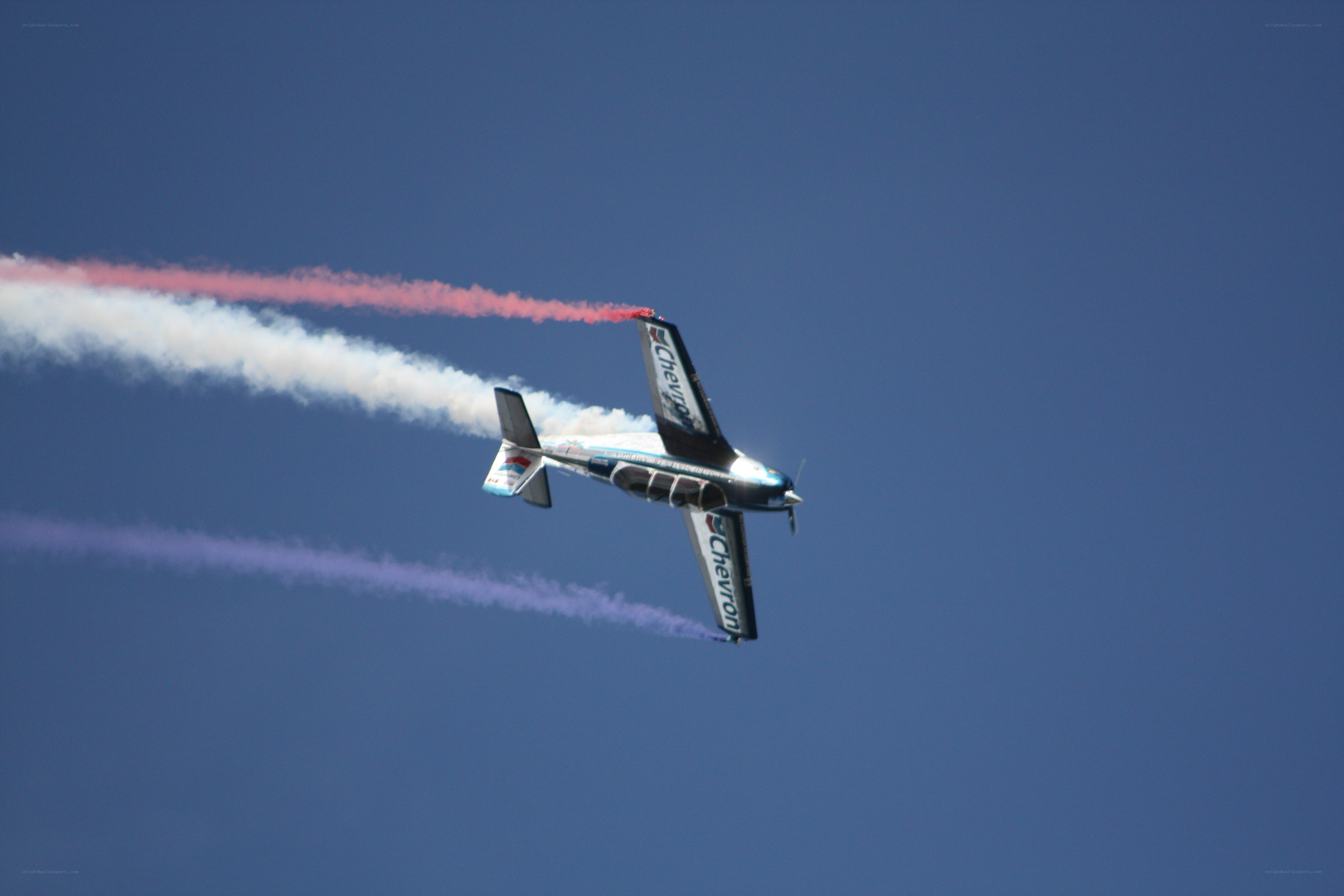 airplane performing aerobatic stunt