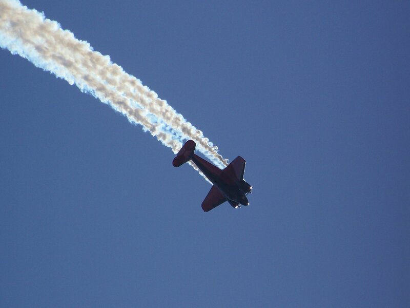airplane performing aerobatic stunt