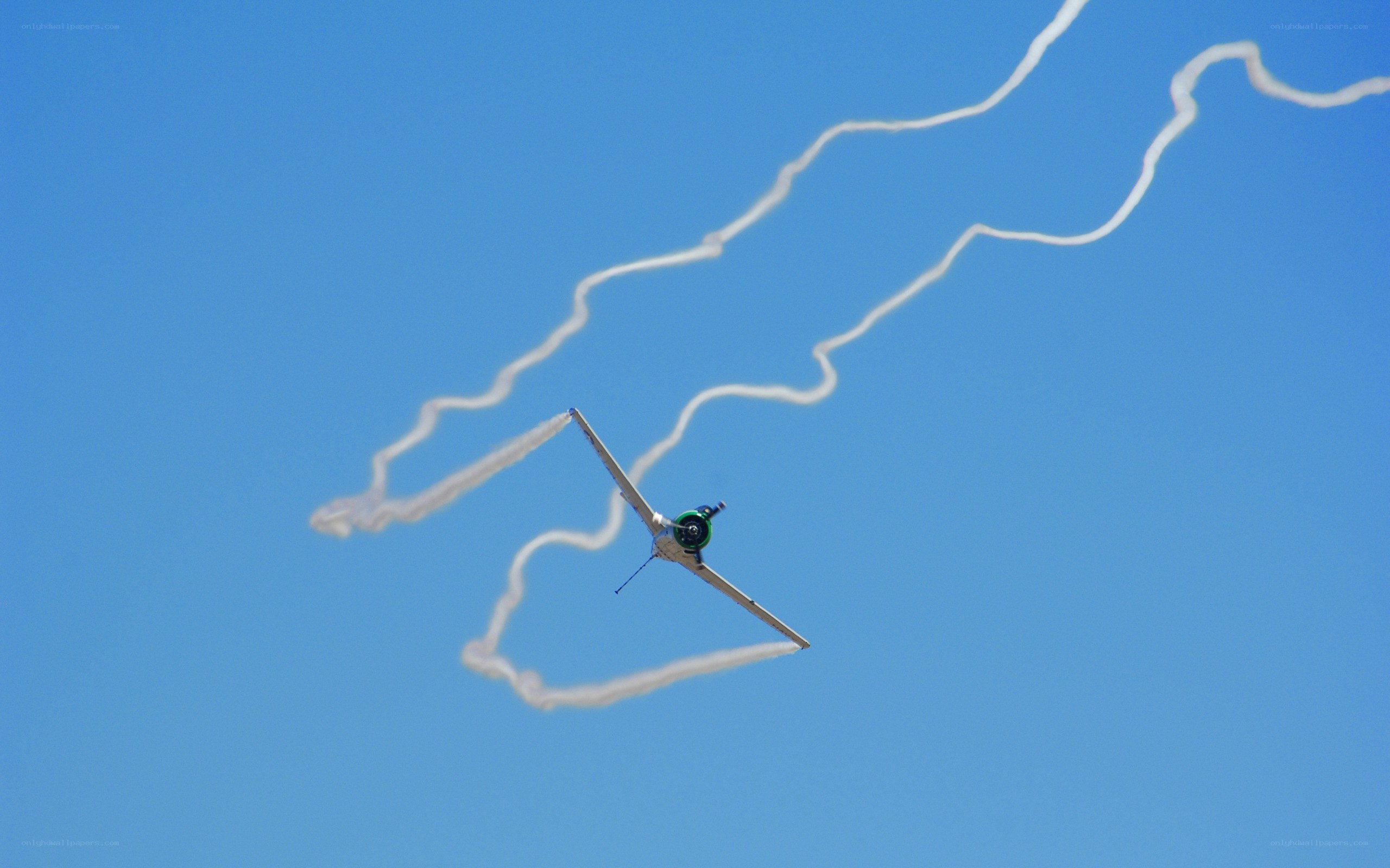 airplane performing aerobatic stunt