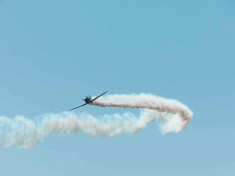 airplane performing aerobatic stunt