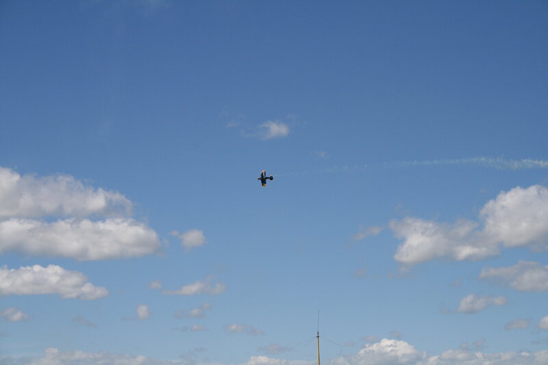 Airplane Performing Aerobatics — Blue