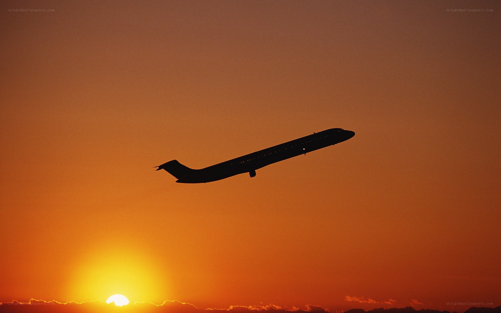 airplane silhouette at sunset