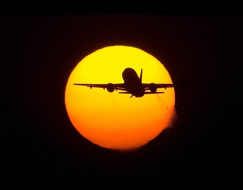 airplane silhouette at sunset