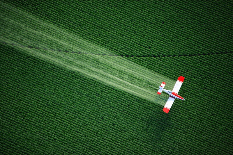 Airplane Spraying Crops