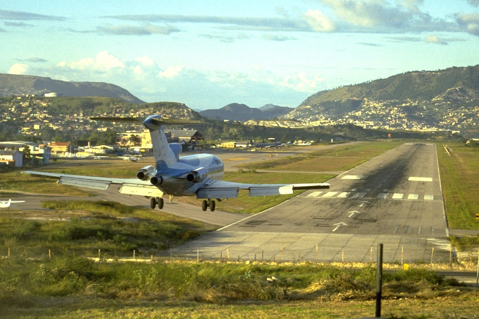 airplane taking off from runway