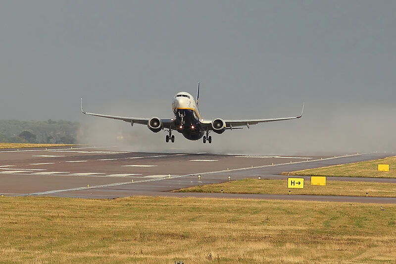 Airplane Taking Off — Gray, Dramatic