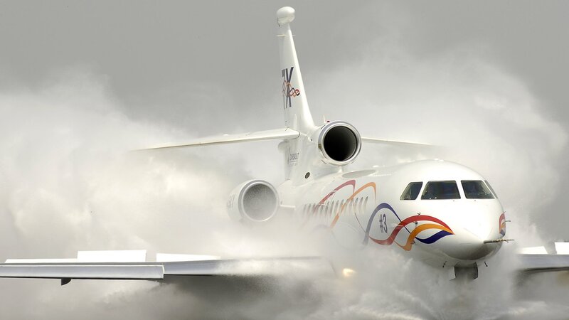 airplane taking off in rain