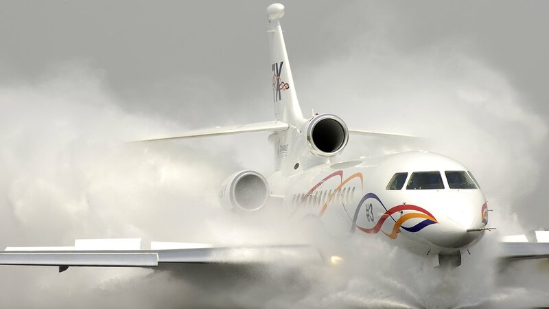 airplane taking off in rain