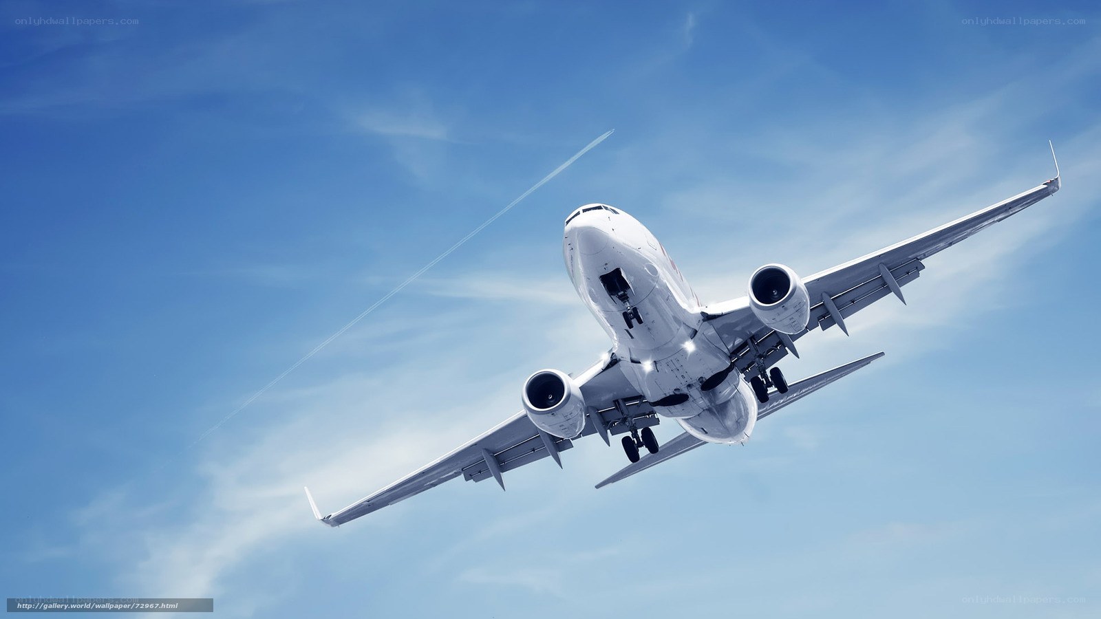 airplane taking off into blue sky
