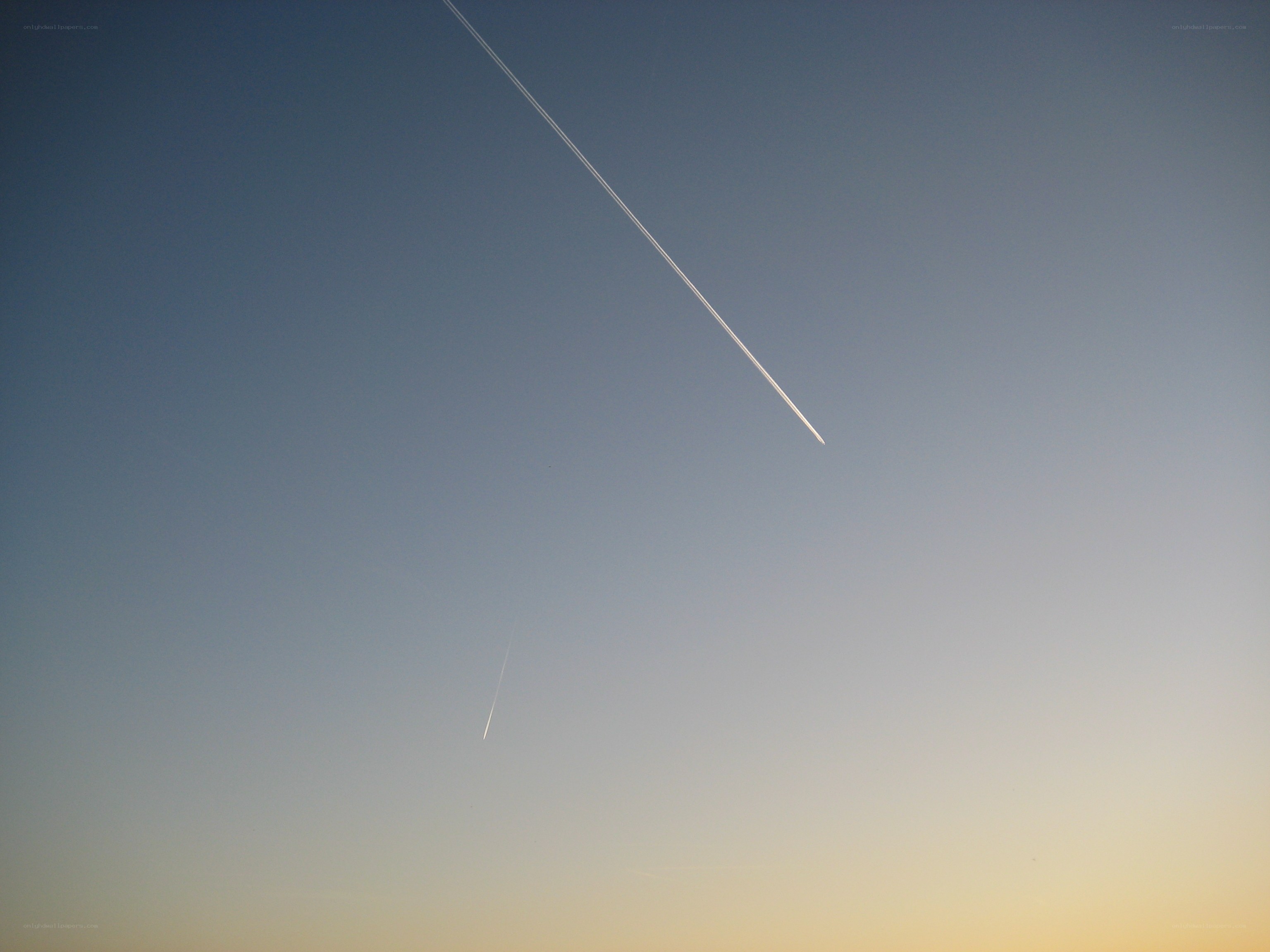 airplane trails in sky