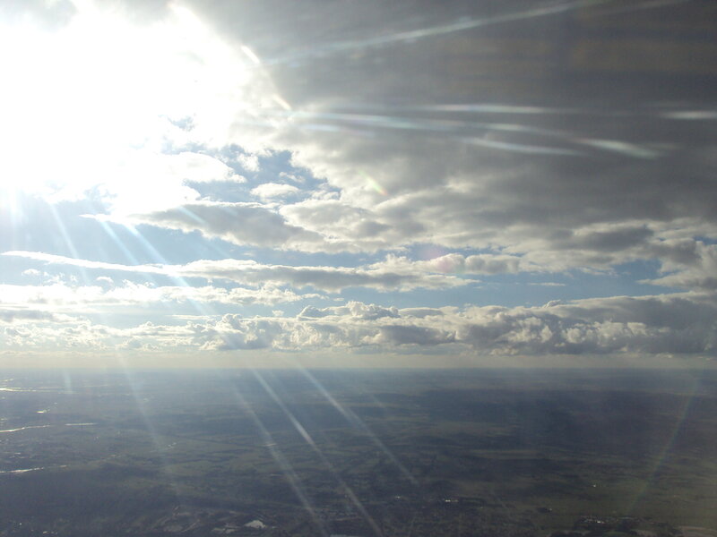 Airplane View of Clouds — Blue, Dramatic