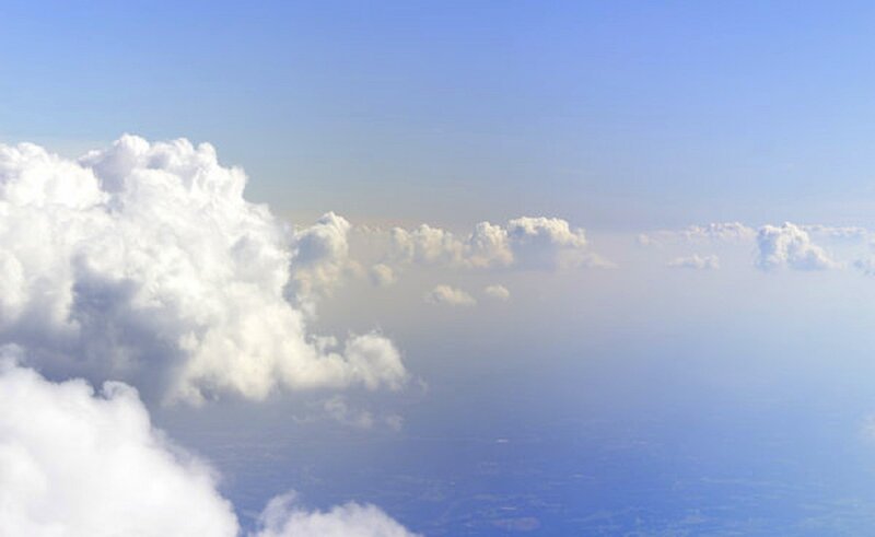 Airplane View of Clouds — Blue, Serene, Afternoon, Photograph
