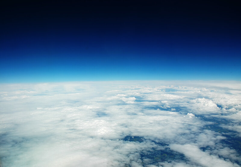 Airplane View of Clouds — Blue, Serene, Daytime