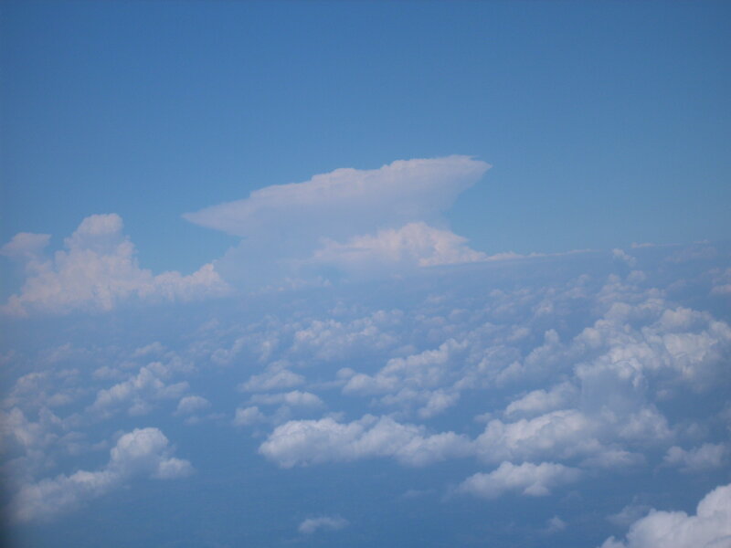 Airplane View of Clouds — Blue