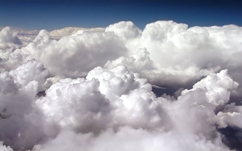 Airplane View of Clouds — White, Serene, Afternoon
