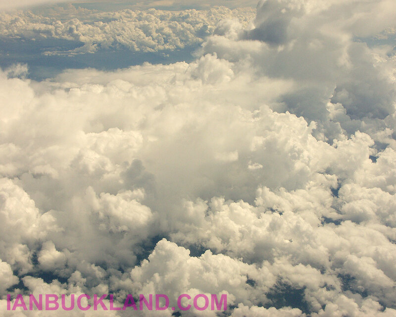 Airplane View of Clouds — White, Serene, Photograph