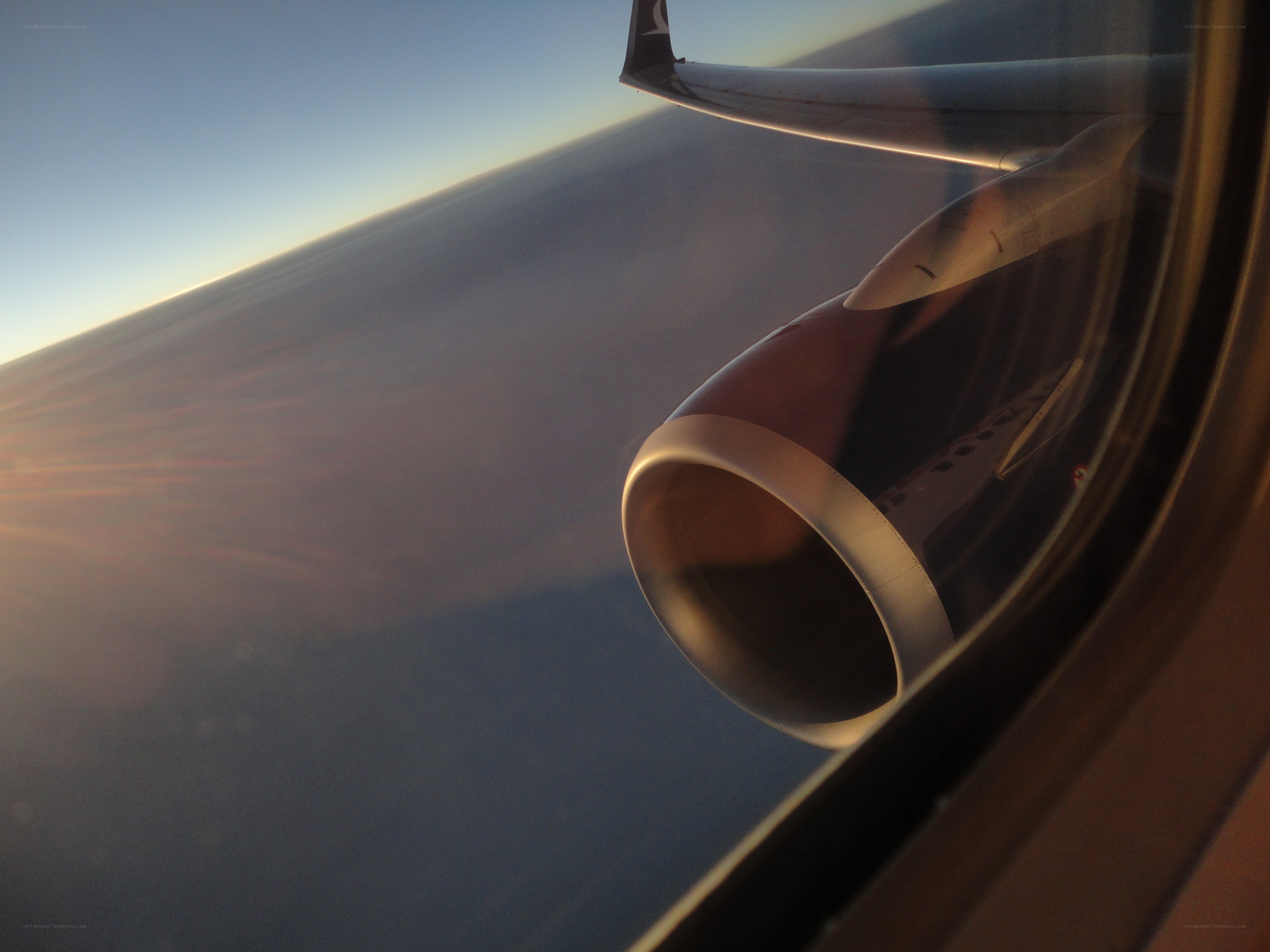 airplane window view at sunset
