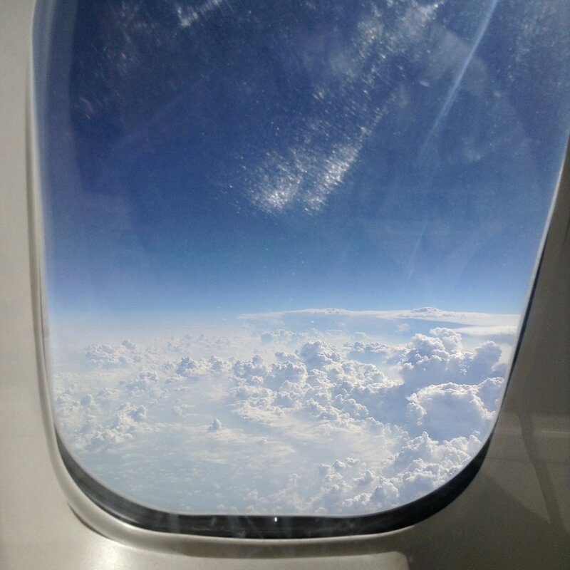 Airplane Window View — Blue, Serene