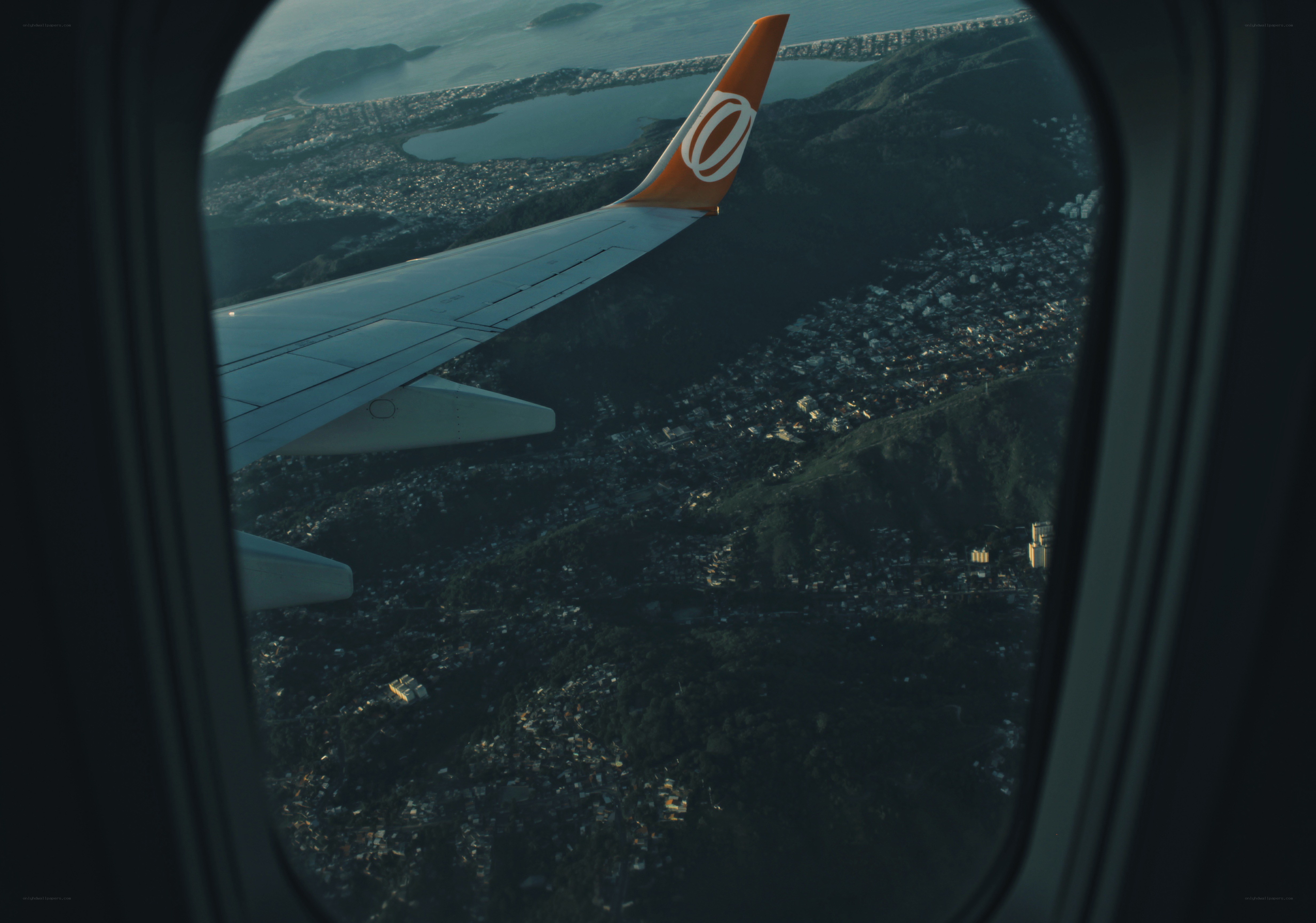 airplane window view of city