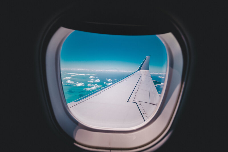 Airplane window view of wing